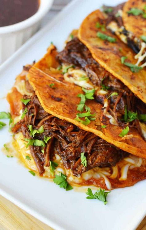 Instant Pot birria tacos are great. A spicy pulled beef recipe made in your pressure cooker or Ninja Foodi with a Mexican flare. Instant Pot Beef Taco Meat, Instapot Birria, Instapot Chuck Roast, Instant Pot Mexican Beef, Instant Pot Birria Tacos, Instant Pot Birria, Brisket Tacos Recipe, Beef Brisket Tacos, Boneless Country Style Ribs