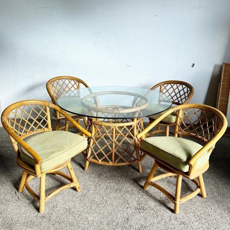 Add a touch of tropical elegance to your dining space with this Boho Chic Bamboo Rattan Circular Glass Top Dining Table by Ficks Reed. The table features a beautifully crafted bamboo and rattan base, showcasing the natural beauty and intricate craftsmanship of these materials. The circular glass top provides a smooth, durable surface that complements the organic feel of the base and allows for easy maintenance. Ideal for those who love to infuse their home with a sense of relaxed sophistication Glass Top Dining Table, Rattan Table, Glass Furniture, Leaf Table, Rattan Furniture, Table Base, Dining Space, Round Dining, Glass Table