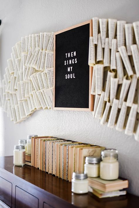 We created a home art instillation using hymnals, a letter board, and some thumb tacks. It's a beautiful hymnal wall full of texture and creamy natural colors. Full of meaning for the music lovers in our family and similar to the book wall. I love the simple hymn, then sings my soul, so that's at the center of this hymn wall art. The hymn art is unique and full of farmhouse charm. Hymnal Wall Art Instillation and Our "New" Piano Book Wall Art Ideas, Wall Art Books, Bookstore Design, Red Ceiling, Hymn Wall Art, Hymn Art, Inexpensive Art, Then Sings My Soul, Office Background