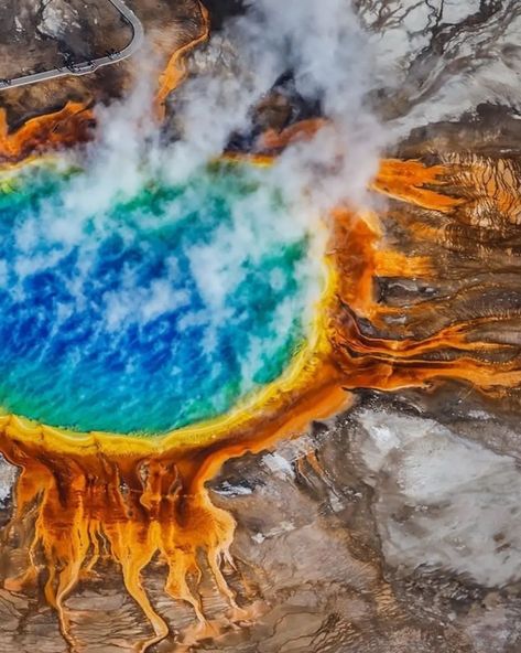 Yellowstone National Park 🏞️, USA🇺🇲 . . The Grand Prismatic Spring in Yellowstone National Park🌄 is the largest hot spring in the United States🇺🇲, and the third largest in the world, after Frying Pan Lake in New Zealand🇳🇿 and Boiling Lake in Dominica🇩🇲. The bright, vivid colors in the spring are the result of microbial mats around the edges of the mineral-rich water. In the summer☀️, the mats tend to be orange and red, whereas in the winter the mats are usually dark green. The springs ♨️ are ... Grand Prismatic Spring, Nature Wonders, Grand Prismatic, Gorgeous Scenery, Hot Spring, Yellowstone National, Yellowstone National Park, Aerial Photography, Frying Pan