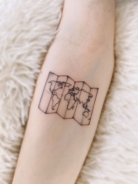 Paper Map Tattoo, Minimalist World Tattoo, Gis Tattoo, Road Map Tattoo, Travel Stamp Tattoo, Geography Tattoo, Travel Tattoo Design, History Tattoo Ideas, Traveler Tattoos