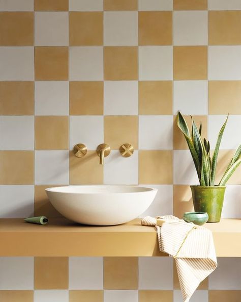 Claybrook UK on Instagram: "Creating a chequerboard look just got a whole lot simpler, thanks to these Vintage Vibes porcelain tiles. Great for both walls and floors, the range is available in a number of shades and patterns; the Sand and Greige hues were used in this bathing space. The worktop was built by the contractor and then painted in Hay Bale, a lovely sunny shade from the vegan-friendly Claybrook Colour paint palette. Our Solar Bowl and Bournbrook brass taps complete the visually uplift Checkerboard Floor, Yellow Tile, Kitchen Splashback, Yellow Bathrooms, 아파트 인테리어, Terracotta Tiles, Porcelain Flooring, Tile Installation, Painted Floors