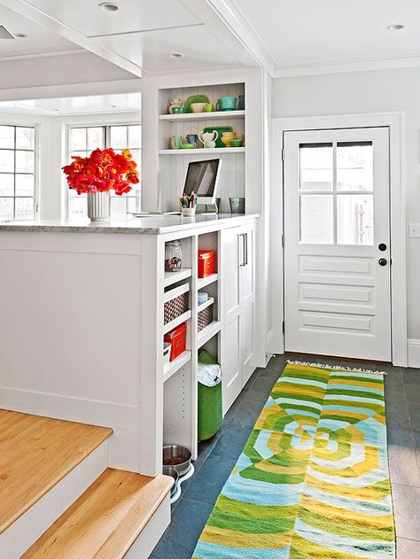 This back-door entry cleverly uses the backside of the kitchen cabinetry for storing items that transition between indoors and out: http://www.bhg.com/home-improvement/storage/friendly-and-functional-entries/?socsrc=bhgpin041514doublesidedstorage&page=3 Entry Tables, Traditional Style Decor, Small Entryway, Room Partition, Built In Bookcase, Kitchen Cabinetry, Room Doors, Back Doors, Entry Doors