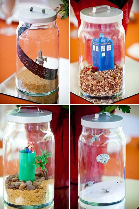 Go home all other centerpiece pins.  We're done here. Geeky terrarium centerpieces FTW! | Offbeat Bride Diy Geek, Terrarium Centerpiece, Nerd Wedding, Geeky Wedding, Geek Diy, Nerdy Wedding, Geeky Craft, Geek Wedding, Crochet Geek