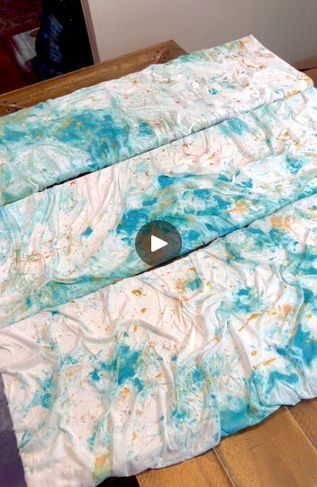 best wall art hack ever | best wall art hack ever  This #DIY arts and crafts video shows how to turn bed sheets into beautiful wall art that looks modern and expensive! | By Brooklyn B | Is a fitted bed sheets. You want three pieces for this. Add your three sheets to a bucket in no particular order and now I've got a big old tub of glue. We're going to pour some in to a nice drizzle over top your sheets then add some metallic gold paint. Look how cool this looks. I have some turquoise paint next. It's a nice muted turquoise. Add some little splotches of your turquoise. Using your gloves mix this all together now these two colors I think just looks so nice together I'm so excited to show everyone how this turns out next slide a large canvas down grab your big boy glue and get a nice pour go Muted Turquoise, Turquoise Paint, Best Wall Art, All Together Now, Metallic Gold Paint, Fitted Bed, Turquoise Painting, Art And Craft Videos, Fitted Bed Sheets