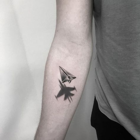 Pin em tattoo Jet Tattoo, Paper Airplane Tattoos, Paper Plane Tattoo, Wrist Band Tattoo, Tattoo Leggings, Plane Tattoo, Shadow Tattoo, Tatuagem Masculina Pequena, Small Girly Tattoos