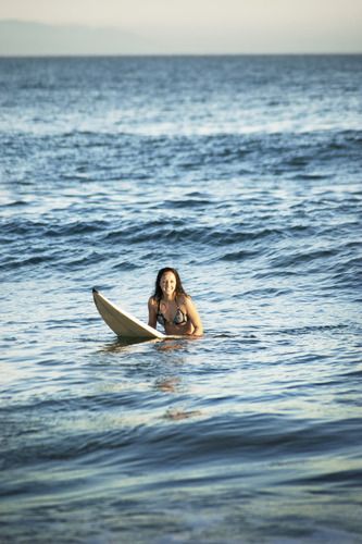 Surfer sitting on board in water stock photo - OFFSET Surfer Sitting On Board, Summer Projects, Craft Art, Face Care, In Water, On Board, Pool Float, Stock Photography, Surfing