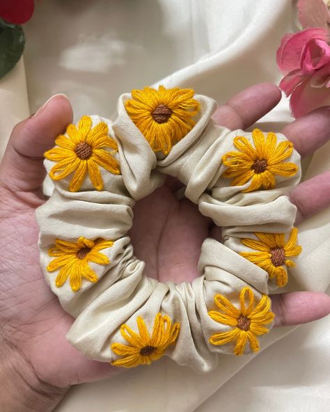 This summer add some “sunflowers” to your hair!🌻 Brighten your day (and the season) with the sunshine scrunchie… DM @_philosophica to grab yours today!! (embroidery, embroidery art, sunflower, embroidered scrunchie, hand-embroidered scrunched, small business) #philosophica #embroideryart #embroidery #sustainablefashion #ecofashion #smallbusiness #supportsmallbusiness #handembroidery #scrunchies #scrunchiesindia #handmade #sunflower Embroidered Scrunchie, Handmade Sunflower, Art Sunflower, Summer Sunflower, Hand Embroidery Pattern, Handmade Embroidery, Hand Embroidery Design, Hand Embroidery Patterns, Eco Fashion