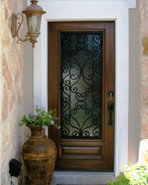 This is a classic look for a Wood and Wrought Iron Front Door! Update the outside of your home by switching out the front door! Front Door/ Entry Door Front Door Update, Spanish Style Front Door, Door Update, Front Door Entry, Wrought Iron Front Door, Entry Door Designs, Metal Front Door, Iron Front Door, Iron Entry Doors