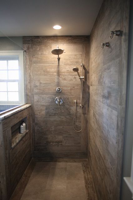 Master Bathrooms With Walk In Showers Stone, Black And Brown Tile Bathroom, Narrow Walk In Shower Ideas, Walk In Shower With Half Wall Stone, 48 X 60 Shower Ideas, Walkin Shower Ideas No Door Half Walls, Step Down Shower Ideas, 4x6 Walk In Shower Ideas, Rustic Spa Bathroom Ideas