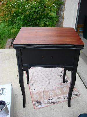 Trash to Treasure Makeover {An Old Sewing Cabinet} | Thrifty Decor Chick | Thrifty DIY, Decor and Organizing Black And Wood Side Table, Sewing Cabinet Redo, Sewing Cabinet Makeover, Old Sewing Cabinet, Old Sewing Machine Table, Old Sewing Tables, Sewing Table Repurpose, Sewing Cabinets, Sewing Tables