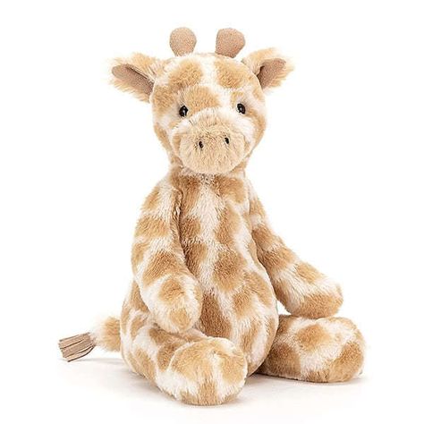 Introducing 'Puffles Giraffe' by Jellycat. Puffles Giraffe is so baby-friendly, in gentle patches of cream and caramel. A gorgeous gift for little ones, this tubby giraffe has soft, squashy horns and a tufty suedey tail. With sweet foldy ears and a butterscotch muzzle, this leaf-munching lovely is a veggie legend! Giraffe Soft Toy, Baby Toy Storage, Gambar One Direction, Jellycat Stuffed Animals, Cute Stuffed Animals, Toy Storage, 귀여운 동물, Soft Toy, Stuffed Animals