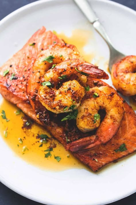 Sweet and savory pan-seared salmon topped with sautéed shrimp in cajun butter sauce. Salmon New Orleans is an unforgettable 30 minute meal your family will crave! Salmon New Orleans Recipe, Salmon New Orleans, Salmon With Shrimp, New Orleans Recipes, Salmon And Shrimp, Butter Salmon, Shrimp And Grits, Recipes Seafood, Tandoori Masala