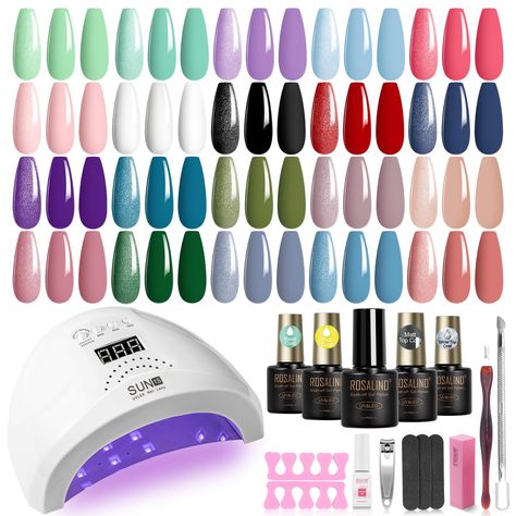 PRICES MAY VARY. The Gel Nail Kit You Will Get: 32 pcs gel polish kit includes 20 bottles of multi-color gel nail polish, 4 bottles of base coat, glossy coat, matte top coat, glitter top coat. And a lightweight 48W nail lamp and manicure tools. Powerful Nail Gel Polish Lamp: Ultra-fast drying UV light gel nail polish dryer with 3 timer settings of 30/60/120 seconds. Display can show the time of use; auto-sensing function, just put your hand in, the light will automatically light up, let go of yo Nail Art Glamour, Nail Polish Dryer, Pedicure Nail Designs, Uv Nail Lamp, Manicure Diy, Gel Nail Kit, Nail Art Set, Nail Polish Kits, Glitter Top