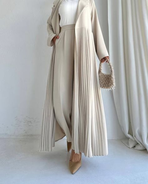 Launching First color for our pleated long coat set Full length Coat with matching Pants and Shyla #abaya #fashion #modestfashion #modestclothing #abayadubai #abayastyle #ootd #abayaoutfit #hijabers #smbymanal #fyp Hijabi Business Casual, Abaya With Pants, Modest Fashion Pants, Pallazo Outfits, Abayas Designs, Designed Outfits, Winter Abaya, Abaya Inspiration, Uae Fashion