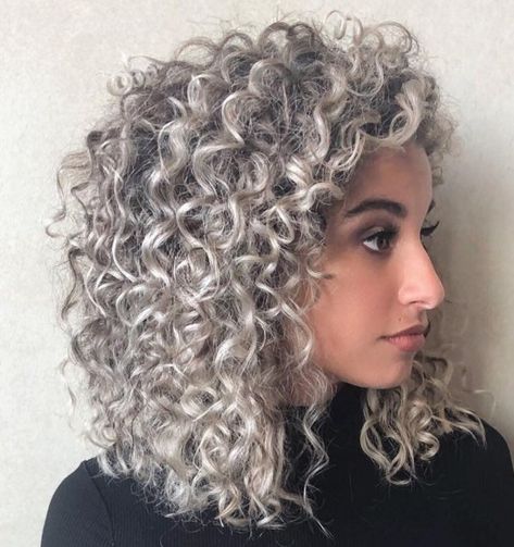 Shoulder-Length Curly Silver Hair Curly Silver Hair, Dark Silver Hair, Silver Ombre Hair, Silver White Hair, Grey Curly Hair, Silver Blonde Hair, Grey Hair Inspiration, Silver Hair Color, Silver Grey Hair