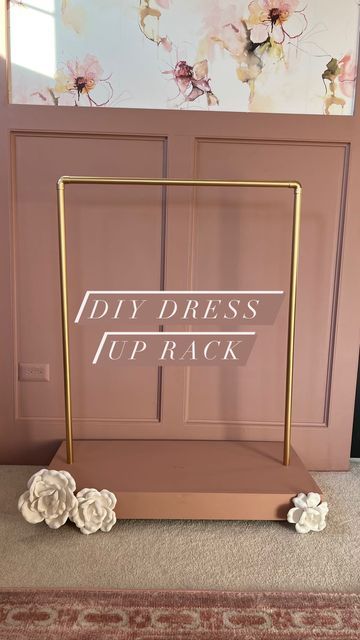 LAUREN BURKE | DIY + Design on Instagram: "⭐️DRESS UP RACK REVEAL!⭐️ Today my baby turned 4 and I built her this cute little dress up rack as a birthday gift! It was a super simple build and made with so much love. See her reaction at the very end 🥰 for full tutorial see my highlight! Would you consider DIYing a gift? I think they are so special! • • • • • • #diyer #dressup #dressuprack #diygifts #kidsroom #girlsroom #ibuiltthat #womenwhobuild #girlswithpowertools #womenempowerment #birthday #g Dress Up Hanging Rack Diy, Diy Play Clothes Rack, Diy Dress Up Clothes Rack, Princess Dress Storage, Diy Dress Up Closet, Toddler Girl Dress Up Station, Girls Dress Up Area, Diy Dress Up Rack, Kids Dress Up Area