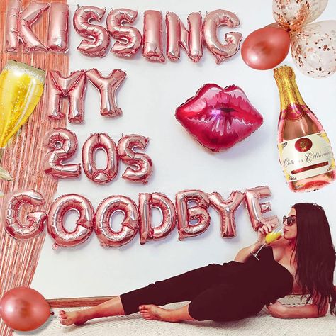 PRICES MAY VARY. Our Kissing my 20's goodbye Balloon is the perfect way to celebrate your 30th Birthday and adds to your birthday party decor. Kissing my 20's goodbye is the ultimate way to celebrate your milestone! You will get : 1 x 30 inch lip balloon, 20 x rose gold latex balloons, 1 x “ Kissing My 20s Goodbye” 1 x rose gold rain curtain, 1 x champagne balloon, 1 x bottle balloon. You can inflate them yourself with air and a straw. The balloons are not made to float with helium Note: the pac February 30th Birthday, 30 Th Birthday Party Ideas For Women Decoration, 30 Birthday Decoration Ideas, Themes For 30th Birthday Party For Women, 30th Birthday Backyard, Thirty And Thriving 30th Birthday, 30s Theme Birthday Party, 30 Birthday Decor, Kissing 30s Goodbye