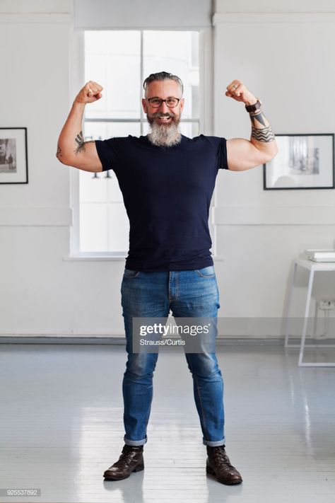 Stock Photo : Smiling muscular Caucasian hipster man flexing biceps Man Flexing, Will Poulter, Flexing Biceps, Hipster Man, Flexing, Free Stock Photos Image, Bearded Men, Pose Reference, Normcore