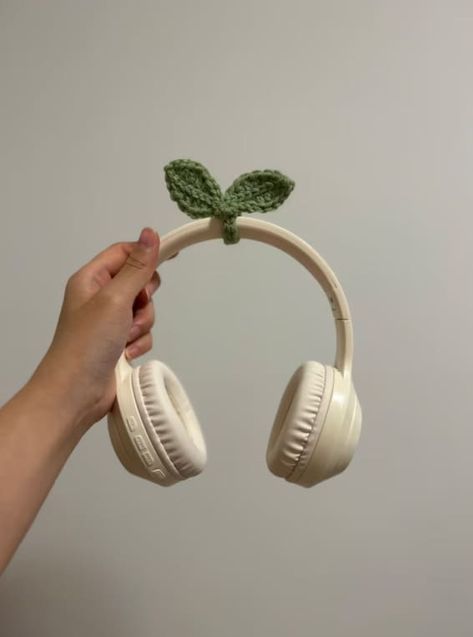 26 Amazing Gifts for Plant Lovers That'll Be A Big Hit Leaf On Headphones, Crochet Leaf Headphone, Crochet Sprout Headphones, Bag Designs Ideas, Headphone Sprout, Crochet Accessories Ideas, Crochet Leaf Sprout, Crochet Sprout, Nature Crochet