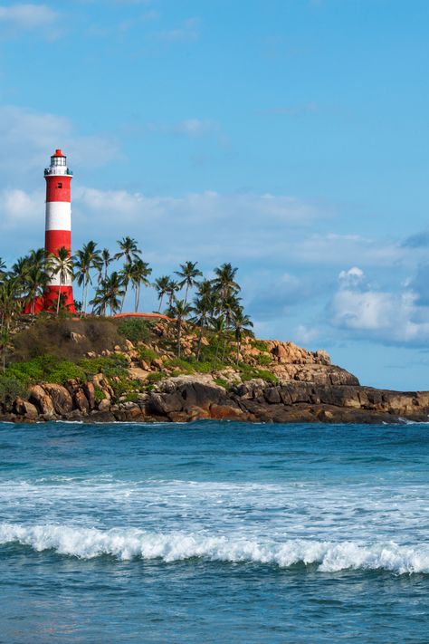 At Kovalam Beach, visitors are treated to stunning golden sands, gentle waves, and the iconic Lighthouse Beach, where they can climb the lighthouse for panoramic views. Hawa Beach offers a lively atmosphere with local fishermen at work, while Samudra Beach provides a peaceful, quiet retreat. The sunset here is a must-see, with the sky turning vibrant hues of pink and orange. Visitors can also explore local markets, indulge in Ayurvedic treatments, and enjoy water sports like surfing and parasail Kovalam Beach Kerala, Kerala Beach, Kovalam Beach, Kerala Travel, Kovalam, Best Of Both Worlds, Hindu Art, Beach Holiday, Beach Photography