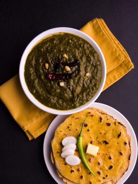 Easy Sarson Ka Saag Recipe: Make the easy and delicious sarson ka saag recipe for winters at home using ingredients like corn flour, mustard leaves, bathua laves, spinach, onion, green chillies and more on Times food Baingan Bharta, Saag Recipe, Chole Bhature, Indian States, Malai Kofta, Protein Rich Snacks, Ghee Butter, Food Photoshoot, Cubed Potatoes