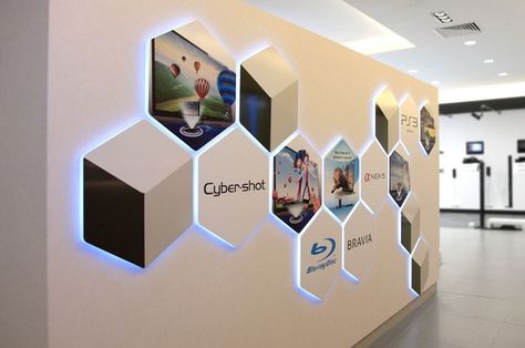 Interesting back-lit wall signage for SONY Creative Office Interior Design Ideas, Exhibit Wall Design, Interactive Wall Design Office, Branding Wall Design Offices, Office Foyer Design, Logo Wall Ideas, Interactive Office Wall, Wall Branding Ideas, Wall Signage Design