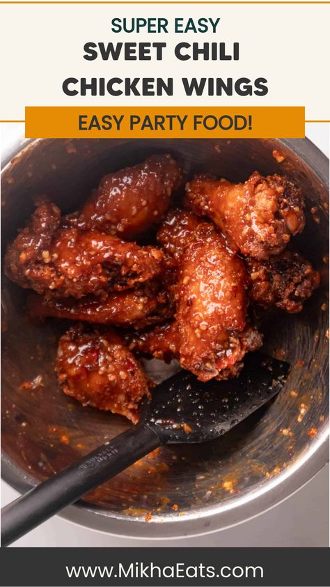 Sweet chili chicken wings in a bowl with a serving spoon, labeled as easy party food. Thai Chili Wings, Chili Chicken Wings, Sweet Chili Chicken Wings, Spicy Chicken Wings Recipe, Sweet Chili Wings, Wings In The Air Fryer, Sweet Thai Chili, Chili Wings, Wings Sauce