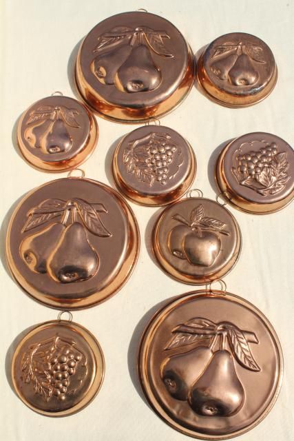 copper molds Copper Molds Display Kitchens, Copper Aesthetic, Corner Wall Decor, Paper Room Decor, Copper Molds, Giant Flowers Diy, Windmill Wall Decor, 1970s House, Kitchen Molds