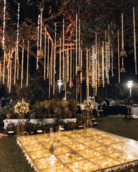 Under the Banyan Tree in her building’s garden in Mumbai, @kamathakanksha and Luke held an intimate wedding celebration with their loved ones. Blending their cultures with a small pooja, Indian ceremonial chants, and a dance-filled Sangeet night, it was a celebration of love, family, and tradition in their own modern way. *Discover the details of their wedding day, by heading to the link in our bio* With Thanks To: Bride / Groom: - @kamathakanksha Venue: The Great Eastern Home @greateastern... Sangeet Night Decor, Tree Wedding Ceremony, Wedding Decor Reception, Sangeet Night, Night Wedding Decor, Night Decor, Sangeet Ceremony, Mumbai Wedding, Wedding Decor Photos