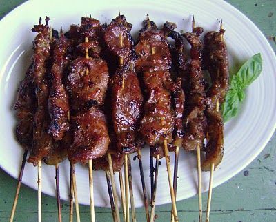 Grilled Pork BBQ On A Stick.  We called it "rat" growing up when we would go to the Chinese buffet, but it was my favorite. This is DELICIOUS. Pork On A Stick, Meat On A Stick, Pork Bbq, Mapo Tofu, Barbecue Pork, How To Cook Pork, Bbq Pork, On A Stick, Barbecue Recipes