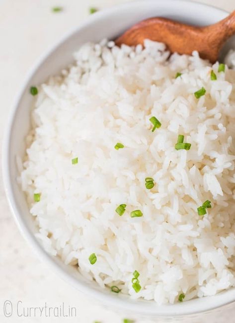 steamed rice with chives on top in white bowl with wooden spoon Rice On Stove, Easy Rice Side Dishes, Coconut Rice Recipe, Rice Side Dish Recipes, How To Boil Rice, Dry Rice, Rice Side, Rice Varieties, Rice Side Dishes