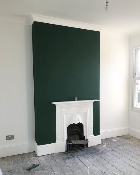 G R E E NNo filter friggin required! Here is my green chimney breast 😬! I was so nervous to put it on (thinking I might have made a total F* up on this paint decision) but after a few rolls, I bloody loved it! The fireplace will now stay white 🙌🏻 (which originally was painted white as a mistake by my dad 😮, but I think that was meant to be). I hope you guys like it. The paint is made by @paintandpaperlibrary and is called Hunter Dunn. #myhousethismonth #revamprestylereveal #greenroom #greenb Green Chimney Breast, Victorian House Bedroom, Green Chimney, Cream Living Room Decor, Fire Feature Wall, Chimney Decor, Green Couch Living Room, Painted Brick Fireplaces, Green Living Room Decor