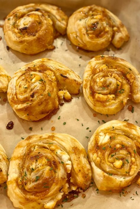 Goat Cheese Pinwheels Appetizers, Goat Cheese Pastry, Hot Honey Cheese Bites, Goat Cheese Puff Pastry Appetizer, Honey Goat Cheese Recipes, Hot Honey Appetizers, Hot Honey Goat Cheese, Puff Pastry Goat Cheese, Goat Cheese Pinwheels