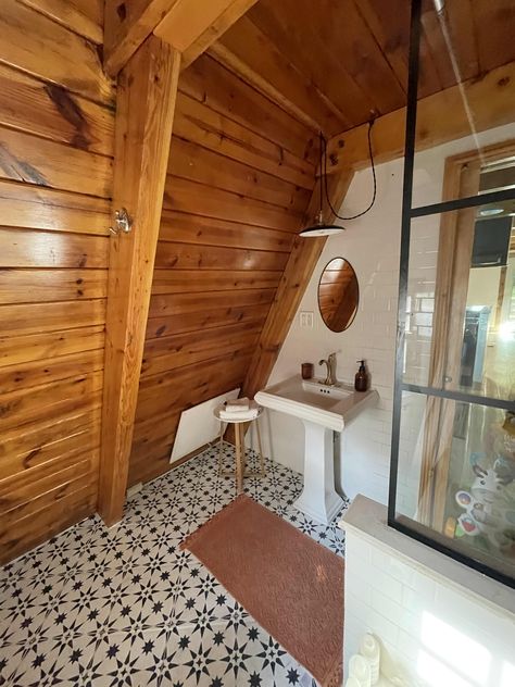 Steffy Degreff 1974 A-Frame Cabin Tour Photos | Apartment Therapy A Frame Cabin Remodel Before And After, Bathroom In A Frame House, A Frame House Exterior Color Schemes, A Frame Bathroom Ideas, Steffy Degreff, A Frame Bathroom, Historic Bungalow, A-frame Interior, Frame Bathroom