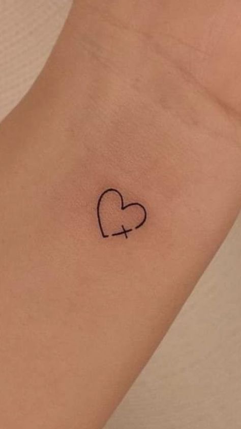 Heart With Cross Tattoo, Small Heart Tattoos For Women, Heart And Cross Tattoo, Feminine Cross Tattoos For Women, Heart Cross Tattoo, Unique Heart Tattoos, 444 Tattoos, Tattoos Between Breast, Cross Heart Tattoos