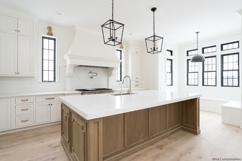 White custom cabinetry with a natural wood large island. Mixed metals pull this kitchen together from the light fixtures to the cabinet pulls. White Kitchen Inspiration, Light Wood Kitchens, Natural Wood Kitchen, Lake House Kitchen, Wood Island, Wood Kitchen Island, White Kitchen Design, Kitchen Inspiration Design, Kitchen Redo