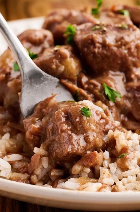 Slow Cooker Beef Tips and Rice is the perfect recipe for busy weeknights! Dump all the ingredients in the slow cooker in the morning and come home to a ready-to-eat, delicious dinner.