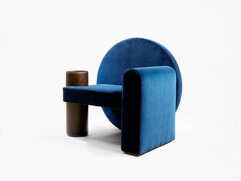 The Valsusa project, through the ancestral tradition of upholstering, shows the link between Piedmont and France. The blue velvet armchair, chosen for its comfort, with an armrest taking the role of leather and walnut shelf. The distinctive sign of our wo… Walnut Shelf, Blue Velvet Armchair, Industrial Office Furniture, Furniture Ads, Wooden Structure, Style Deco, Armchair Furniture, Funky Furniture, Velvet Armchair