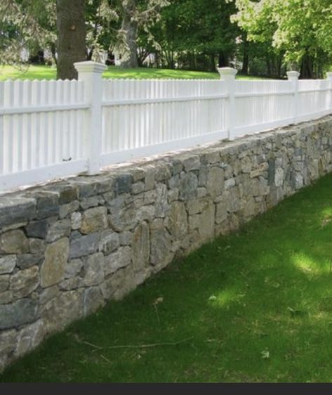 Fence On Stone Wall, Rock Wall Fencing, Fence Post Installation, Outdoor Curb Appeal, Rock Fence, Cape Cod House Exterior, Relaxing Patio, Fence Wall Design, Beautiful Exterior