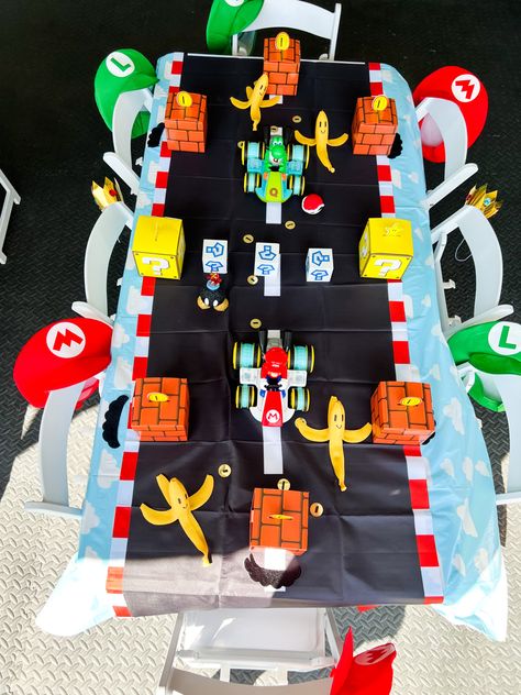 Mario, Mario kart, Mario birthday, mario kart birthday, mario kart party, diy mario, diy mario kart, diy mario decor, mario decor, mario decoration, dollar tree diy, mario table set up, mario kart kids table set up Mario Kart Table Decor, Mario Racing Birthday Party, Mario Kart Birthday Party, Kids Party Table, Mario Kart Party, 6th Birthday Boys, Kids Party Tables, Sleepover Birthday, Super Mario Birthday Party