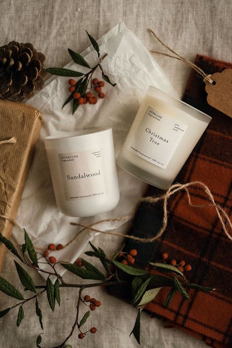 Candle Collection Photography, Candle Christmas Aesthetic, Christmas Candle Photoshoot, Xmas Candles Ideas, Cozy Product Photography, Holiday Candle Photography, Christmas Beauty Products, Christmas Products Photography, Rustic Product Photography