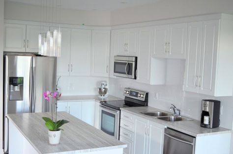 Granite countertops with white cabinets