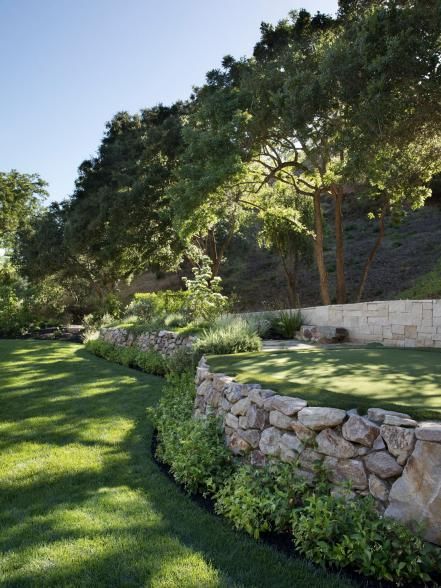 Outdoor Oasis | 2023 | HGTV Steep Front Yard Landscaping Ideas, Garden Design On Hill, Terraced Driveways, Stone Wall Diy Outdoor, Landscape Design On A Hill, Cottage Retaining Wall, Retaining Walls Backyard, Layered Backyard Landscaping, Stone Wall With Plants