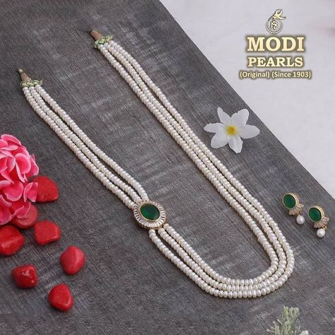 🍀 Royal Emerald Side Pendant Pearl Set 🍀 😍 Three Layered Long Pearl Necklace ✅ Certified Pearls ✅ Real Freshwater Pearls ✅ . . . . Note: Precious Pearls combined with Semi-Precious Stones have been used to make this necklace. . . #modipearls #hyderabadpearls #pearljewelry #pearlnecklace #pearljewelry #hyderabadjewellery #realpearlsjewellery #chennaijewellery #delhijewellers #banglorejewellery #jaipurjewelry #freshwaterpearl #ricepearls #pearlnecklace Jaipur Jewelry, Long Pearl Necklace, Long Pearl Necklaces, Real Pearls, Pearl Set, Semi Precious Stones, Pearl Jewelry, Semiprecious Stones, Precious Stones