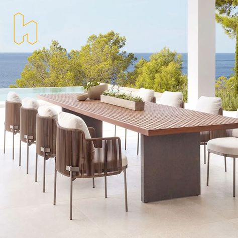 Bring an ideal addition to your outdoor space with this dining set. Featuring a natural and elegant style, this set can easily bring a touch of glamour to outdoor places such as patio, garden, terrace, etc. Crafted from weather-resistant rope and teak wood, it is able to withstand numerous unexpected situations and remain durable. And the high-density foam definitely brings you optimal comfort. Luxury Garden Furniture, Rattan Lounge Chair, Outdoor Tables And Chairs, Rattan Garden Furniture, Teak Dining Table, Patio Dining Table, Stylish Chairs, Table And Chair, Garden Furniture Sets