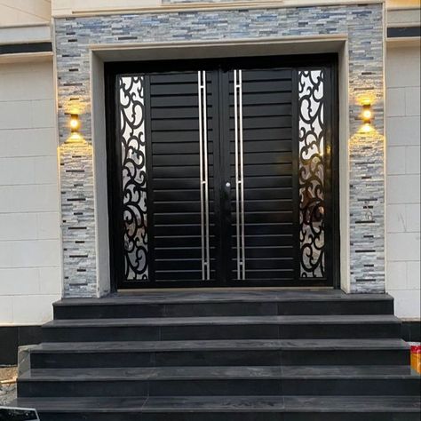 #interiorindori #maingatedesign #maingate 
#moderngatedesign #irongate #steelgate #ssgate 
#frontgate #housemaingate #maindoordesign #gatesdesign 
#homefrontgate #maingate_design #maingateforhouse Main Door Iron Design, Modern Iron Door Design, House Front Gate Wall Design, House Front Gate Modern House Front Gate, Steel Gate Design Modern Entrance, Iron Double Door Design, Main Gate Door Design, Iron Door Design Modern, Home Front Gate Design