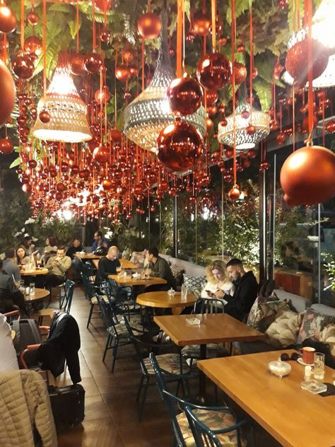 Christmas decoration coffe bar restaurant by stinteriordesign.gr Christmas Decorations Bar Restaurant, Christmas Decoration For Restaurant, Christmas Decor Ideas Cafe, Christmas Decor Ideas For Restaurant Bar, Christmas Decor Ideas For Cafe, Pub Christmas Decor, Christmas Decor Restaurant Ideas, Christmas Pub Decorations, Christmas Coffee Shop Decorations