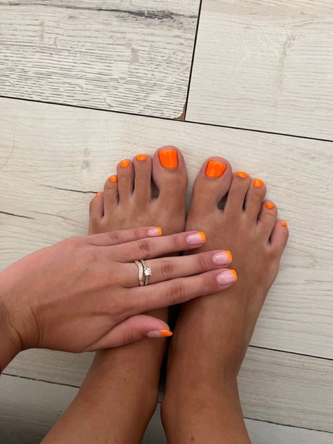 Manicure and pedicure. Orange 2022 Preppy Pedicure Ideas, Summer Manicure Pedicure Combo, Hawaii Toenails, Matching Manicure Pedicure Ideas, Vacation Manicure And Pedicure, Holiday Mani Pedi Combo, Beach Vacation Mani Pedi, Orange Nails And Toes, Summer Mani Pedi Combos 2024