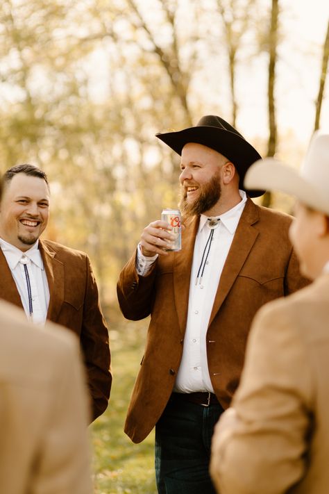 Bolo tie wedding Dressy Cowboy Outfits Men, Cowboy Outfits Men, Groom In Jeans, Tan Suit Wedding, Bolo Tie Wedding, Tan Suit, Cowboy Outfits, Groomsmen Suits, Western Wedding